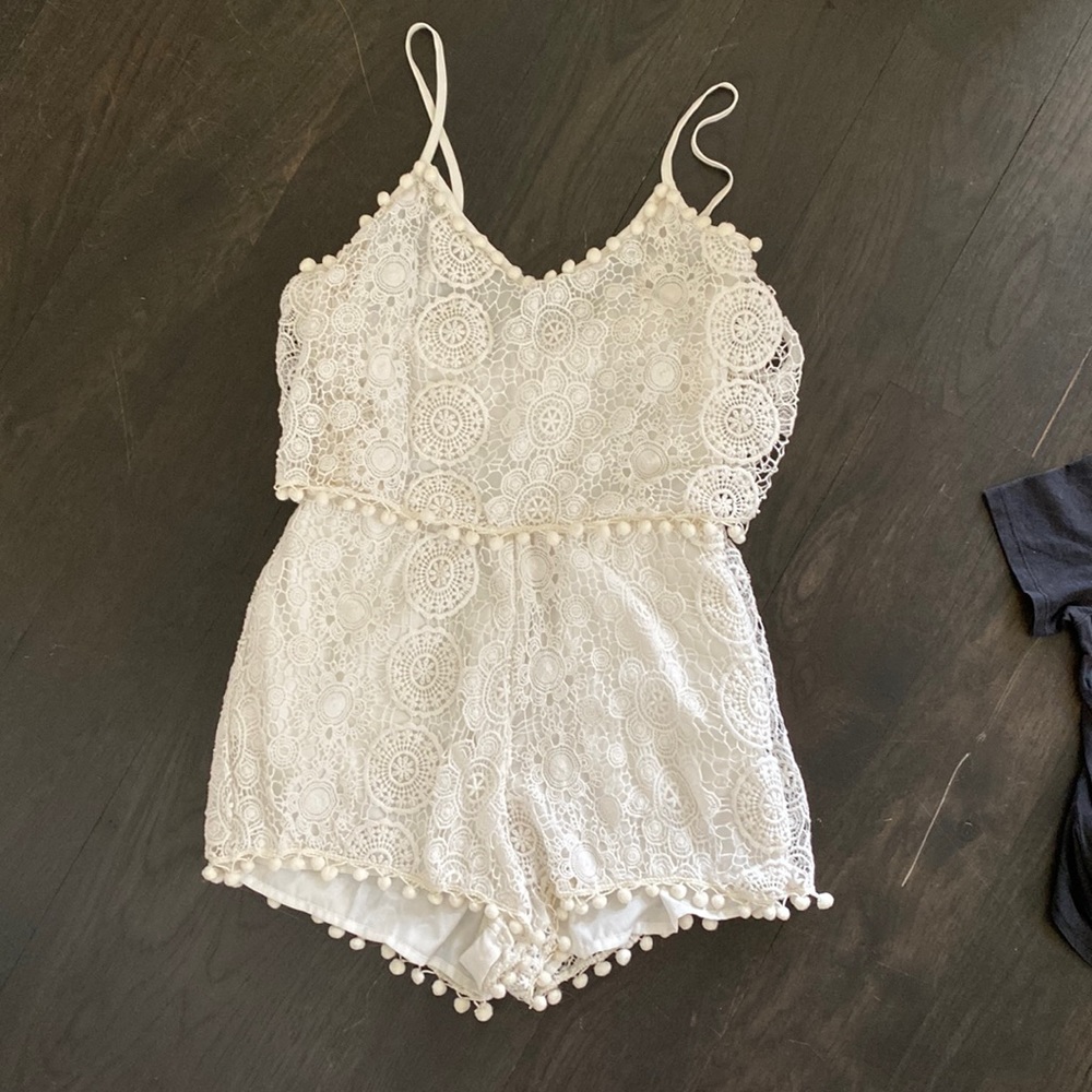 TULAROSA White crochet romper with Pom Pom details